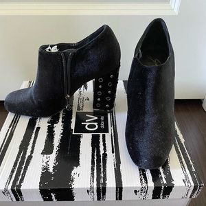 Black Italian booties with embellished heel